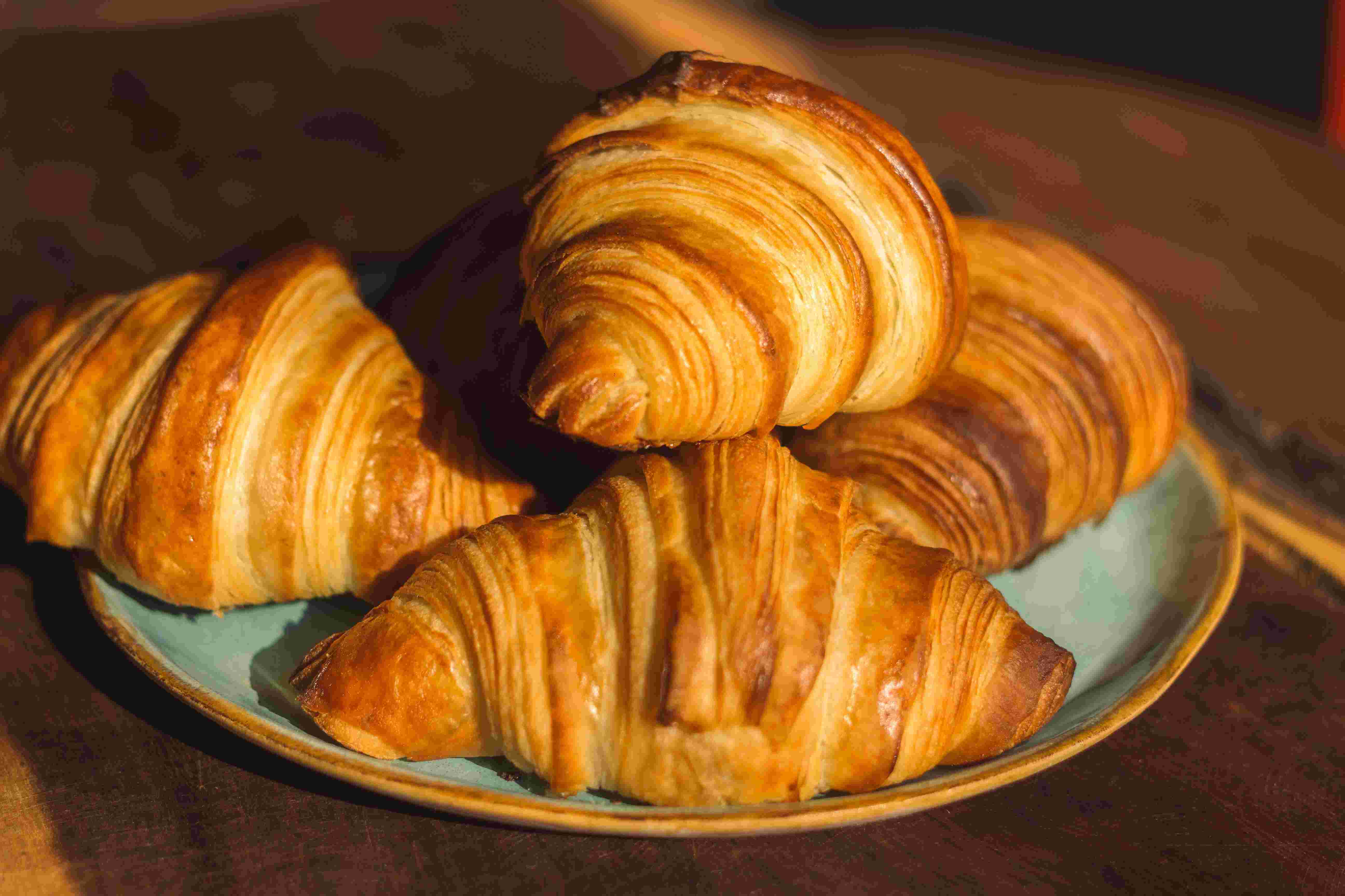 Butter croissants on a baking tray